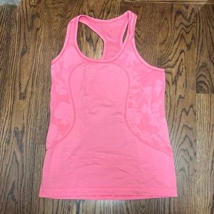 Women’s Lululemon swiftly tech razorback Tank, size 8. Excellent Condition!